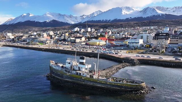 Saint Christopher Boat At Ushuaia In Tierra Del Fuego Argentina. Saint Christopher Boat. Ship Sculpture. Downtown Cityscape. Saint Christopher Boat At Ushuaia In Tierra Del Fuego Argentina.
