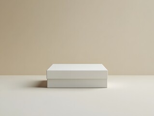 Minimalist white box mockup displayed flat on a neutral surface, with soft, natural lighting