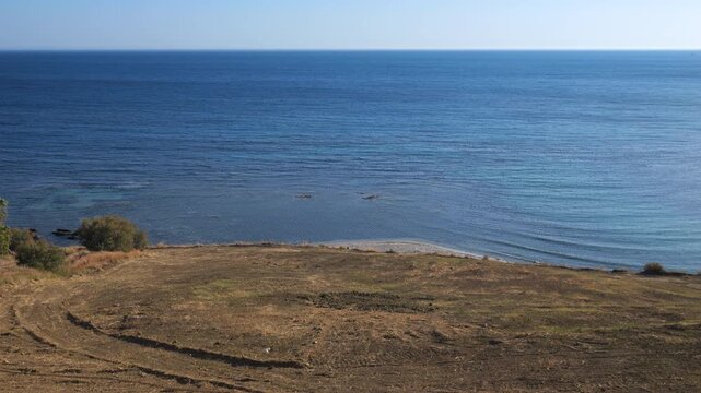 Pan over the south coast of Sicily in the summer