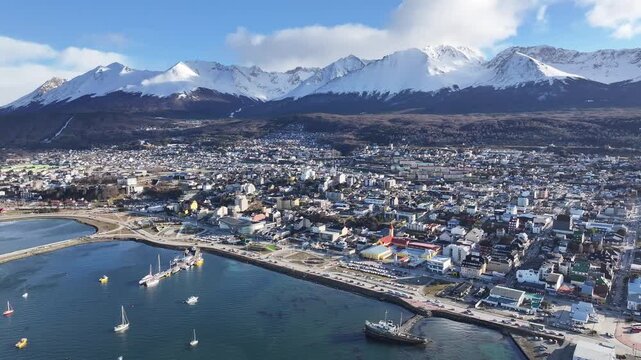 Ushuaia Skyline At Ushuaia In Tierra Del Fuego Argentina. Snow Capped Mountains Landscape. Patagonia Background. Downtown Cityscape. Ushuaia Skyline At Ushuaia In Tierra Del Fuego Argentina.