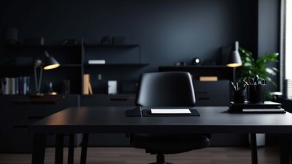It's a dark office with a desk, chair, lamp, and a plant. 