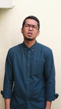 A man showing disappointed expression and asking why