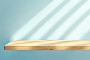 Empty wood table top on a pastel blue wall with sunray patterns background