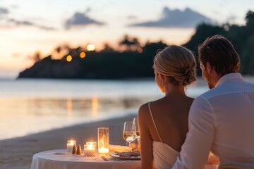 Romance by the Sea: Elegant Couple Enjoying Candlelit Dinner on Private Beach