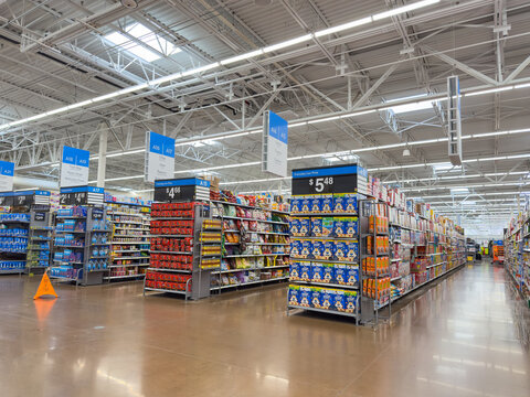 Clean and organized Walmart Super Center grocery store aisles.
