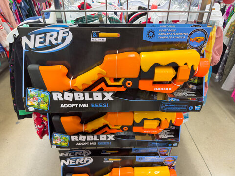 Nerf dart gun featuring Rolox online game characters.