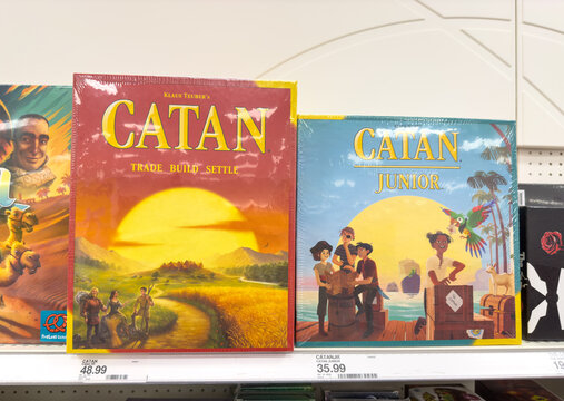 Settlers of Catan board games on display inside a department store. 