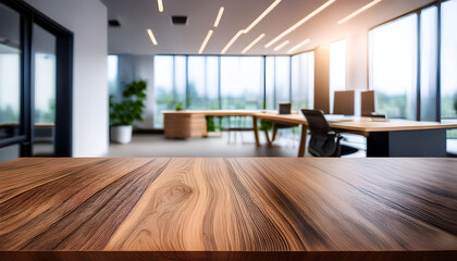Fototapeta premium an empty wooden desk in a modern office with clean lines and a bright, airy atmosphere. The background is gently blurred to focus attention on the desk.