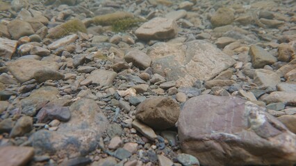 Underwater Rocky Bed in Mountains