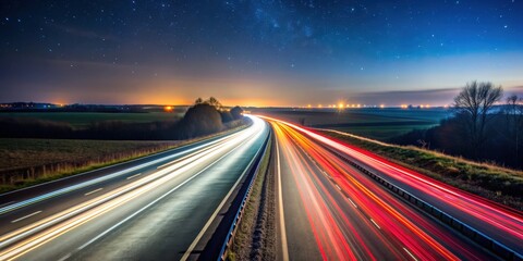 Obraz premium Road to horizon by night with car lights streaking in long exposure shot, night, road, horizon, car lights, streaking