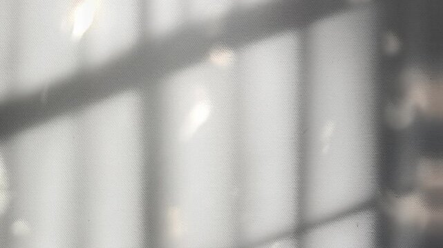 Window shadows on top of dazzling white fabric textures. Aesthetic Video Background.