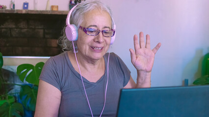 Old woman greeting on a video call