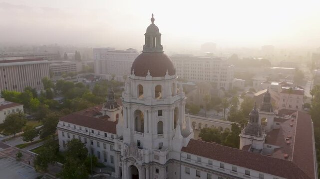 The aerial image highlights the intricate architecture of Pasadena City Hall, set amidst beautifully landscaped gardens, showcasing a blend of nature and urban design in Californias scenery