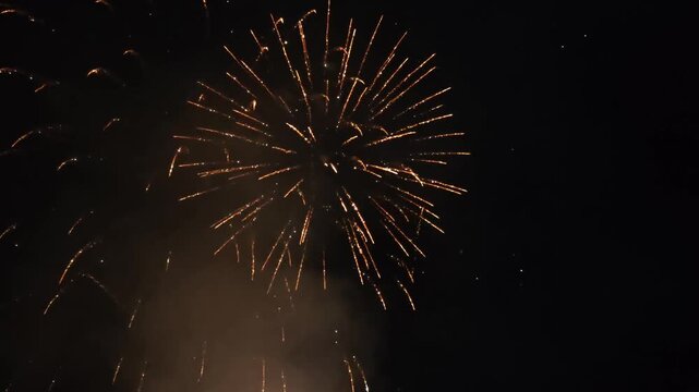 Amazing fireworks footage 4k resolution and loopable.  View of beautiful fireworks at feast of San Lorenzo in the Fiastra lake, Marche region, Italy