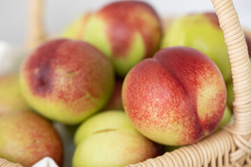 Fresh Organic Heavenly Peaches on white background.