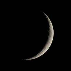 Waxing crescent moon seen with telescope