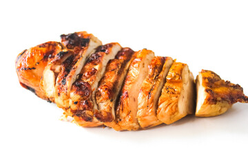 sliced ​​grilled chicken breast on a white background