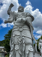 Buddhist Icon with fist raised