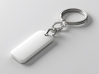 Minimalist white keychain mockup displayed flat with a clean, neutral background