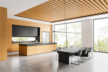 Home kitchen interior with eating table and cooking cabinet. Panoramic window