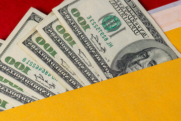 new yellow paper envelopes with American dollars