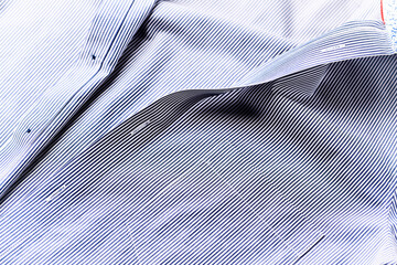 Close up of mens striped shirt.