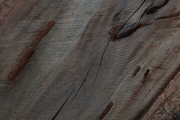 Brown and gray wood surface background with a fault line in the middle