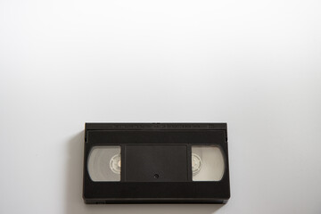 An old retro VHS video tape on a white background