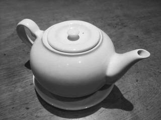 A teapot with black and white photo style, deep of field selective focus