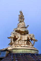 The Golden Summit at Mount Emei, Sichuan China with exquisite giant gold statue of Samantabhadra or Puxian Buddha is popular tourist attraction landmark