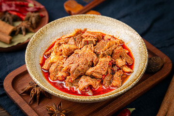 Spicy beef slices are a traditional Chinese delicacy with a spicy taste and red oil.