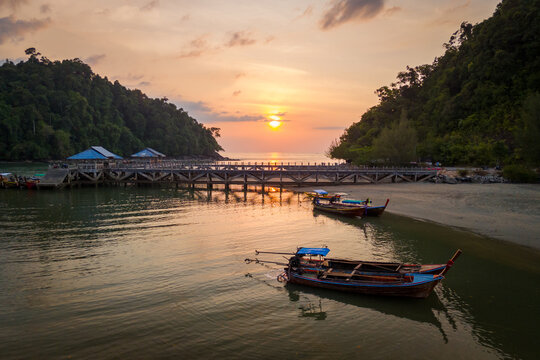 Aerial scenery of the Bang Ben beach with longtail boats in the morning