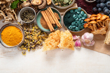 Adaptogen healthy food. Herb and spice collection on light background