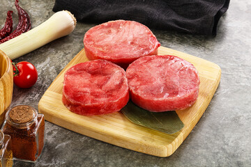 Delicous raw tuna medallion for cooking