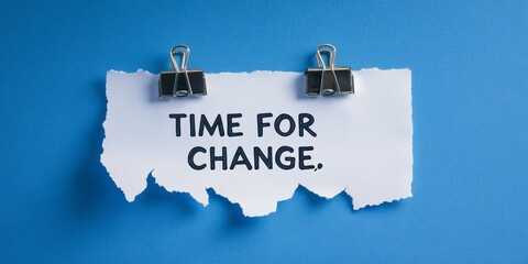 Transformative Moment: Torn Paper on Blue Background with 'It's Time for Change' Message, Symbolizing Renewal and the Start of a New Chapter