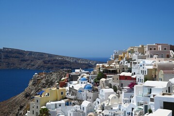 View of the famous white village of Oia, Santorini island, Greece