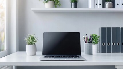 A minimalist small office with a clean desk, a MacBook, a succulent plant, and a sleek filing cabinet