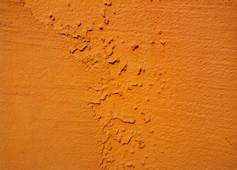 Background, texture of cracked, rough, painted red, orange old wall. Grunge, vintage surface, copy...
