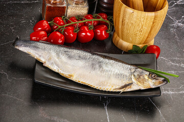 Whole raw salted herring fish