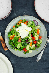salad with Burrata cheese and vegetables