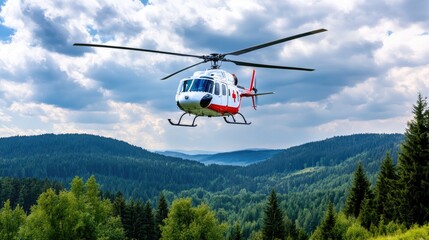 Fototapeta na wymiar A red and black emergency helicopter hovers amidst low clouds and fog, flying over majestic mountain peaks under overcast weather conditions