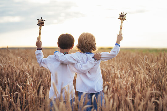 Little Ukrainian Children Boys With Maces - Bludgeon In Field. Bulava, Ukraine.