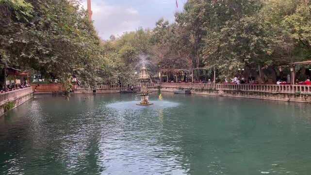 Sanliurfa, Turkey. 08 October 2022. Fountain in Aynzeliha Lake, second sacred pool (Balikligol) .