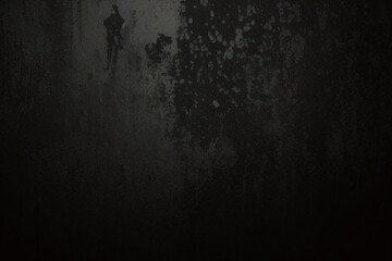 Fototapeta premium Black wall rough texture background, concrete floor or old grunge backdrop, illuminated by sun ray. Close up of dark graphite surface for modern background design. Concept of textures and background.