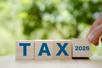Tax increase concept. Tax icon in wood on wooden floor background. tax in 2025