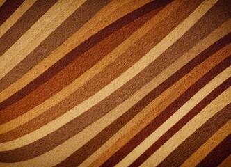 close-up view textured surface with diagonal stripes in various shades brown and beige, creating visually
