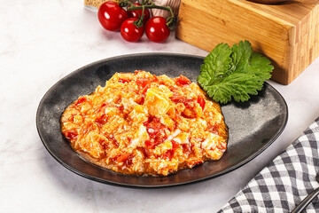 Shakshuka with tomato for breakfast