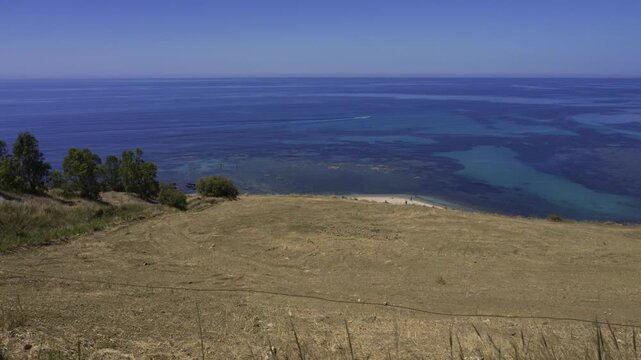 Time lapse pan over the south coast of Sicily in the summer