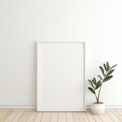 A minimalist interior scene featuring a blank frame and a potted plant.