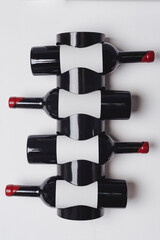 Wine from a private collection lies nicely on a shelf on a white background. mockup